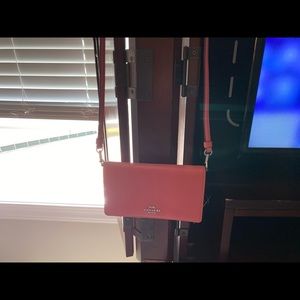 Coach Crossbody wallet- This is  summer coral color